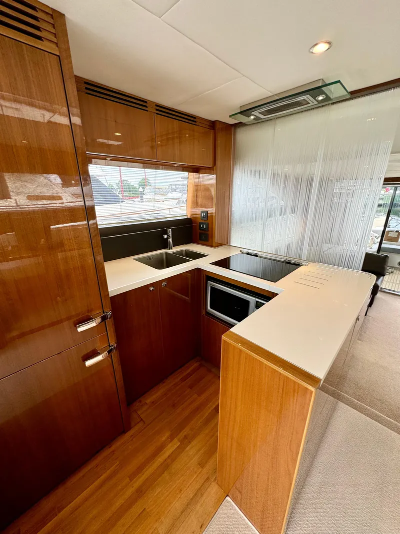 Slide: The Image of Luxurious kitchen interior of 2012 Princess Flybridge 60 Motor Yacht. - 27