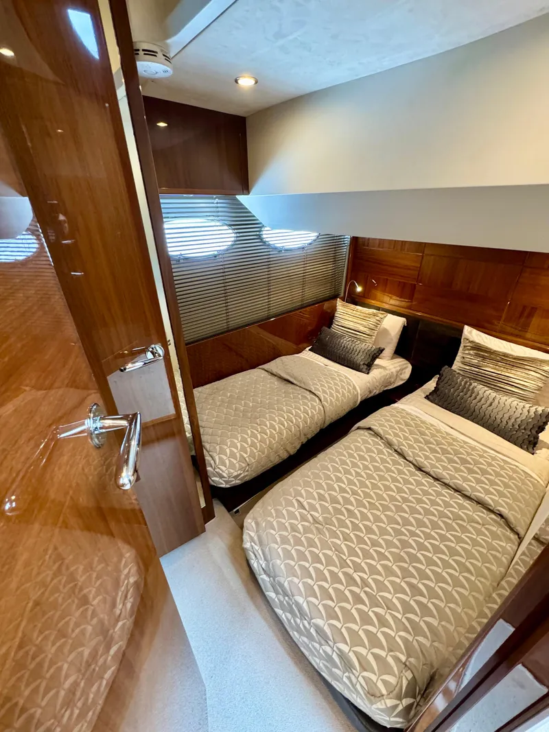 Slide: The Image of Luxurious twin cabin in 2012 Princess Flybridge 60 Motor Yacht with elegant wood finishes. - 47