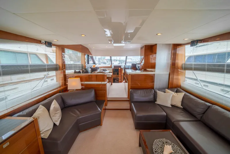 Slide: The Image of Luxurious interior of 2012 Princess Flybridge 60 Motor Yacht with leather seating and modern design. - 9