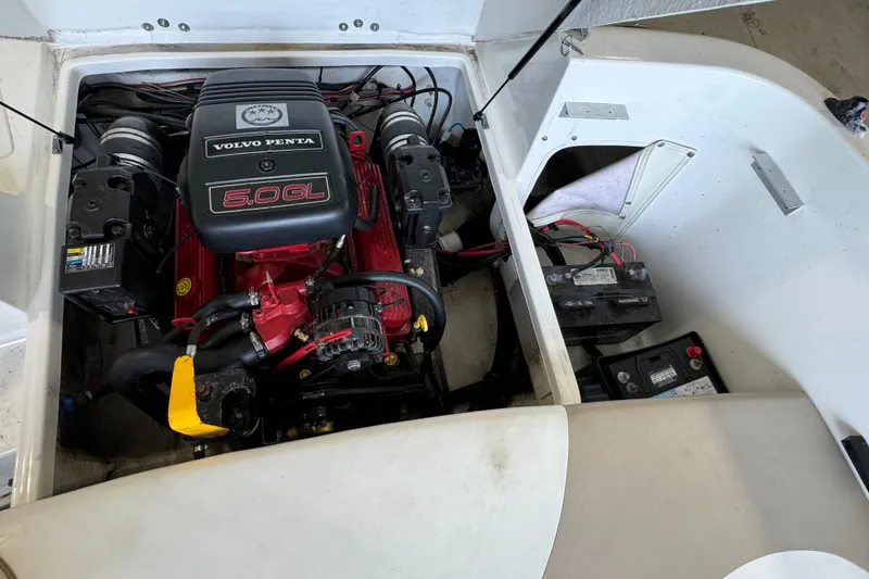 Slide: The Image of 2004 Glastron DX 215 boat engine compartment with Volvo Penta 5.0 GL engine. - 15