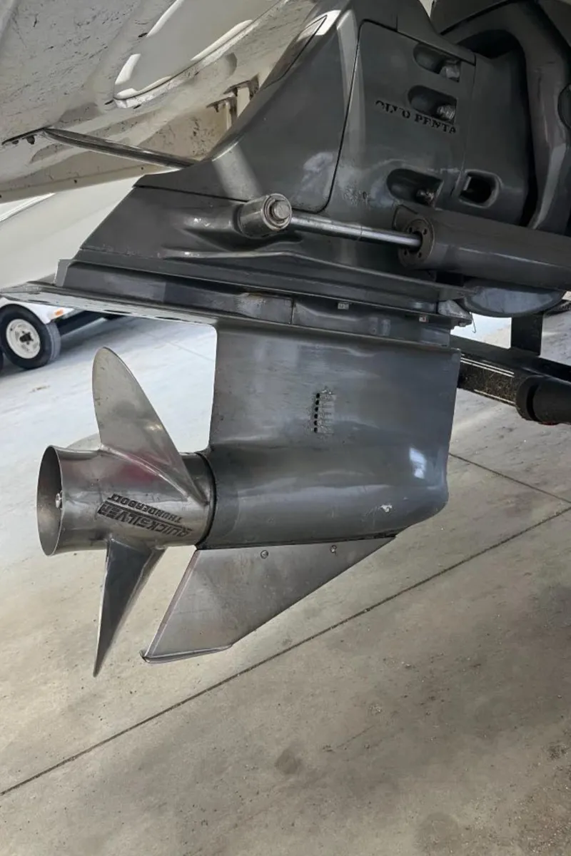 Slide: The Image of Close-up of a 2004 Glastron DX 215 boat propeller and outdrive. - 6