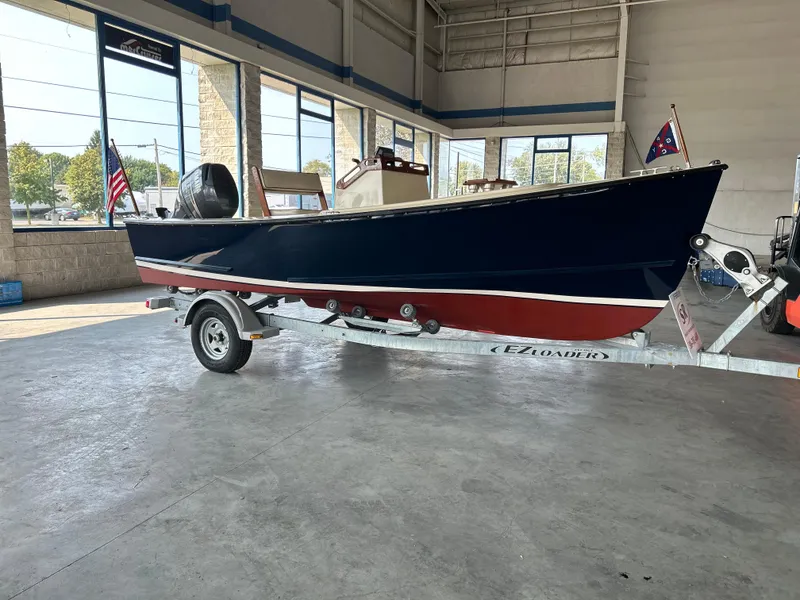 The Image of 2012 Seaway 18 Sportsman boat on trailer in showroom. - 0