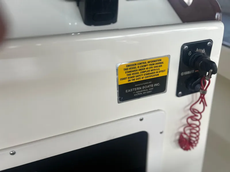 Slide: The Image of Control panel of a 2012 Seaway 18 Sportsman boat with safety warning label. - 6