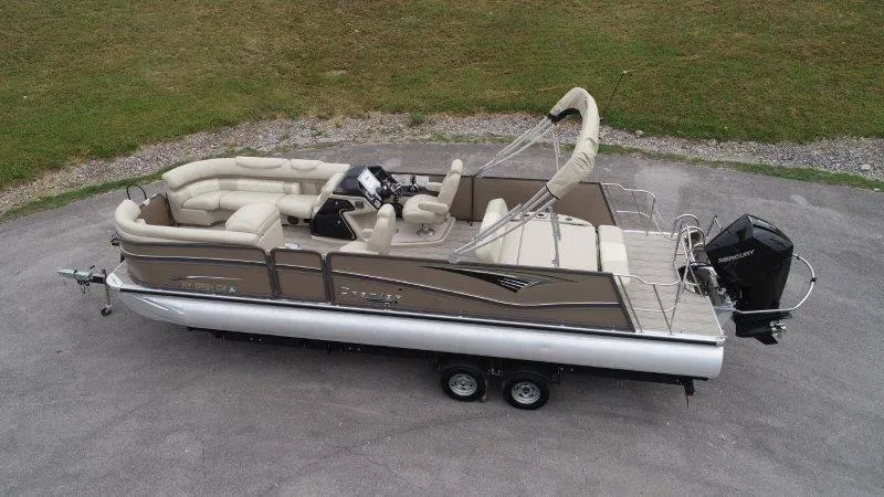 Slide: The Image of 2021 Premier 250 Grand Majestic pontoon boat on trailer, aerial view. - 10