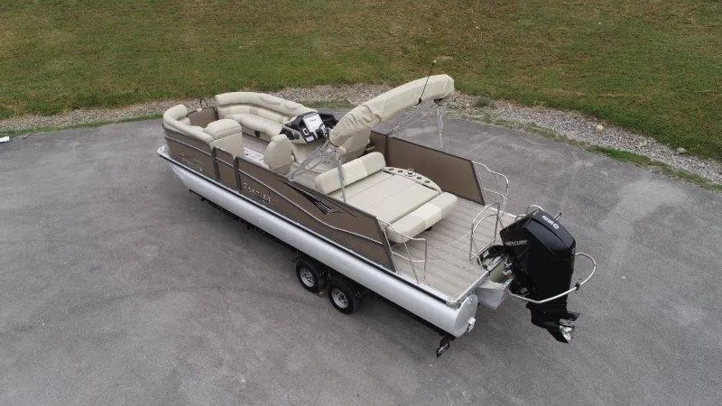 Slide: The Image of 2021 Premier 250 Grand Majestic pontoon boat on trailer, aerial view. - 11
