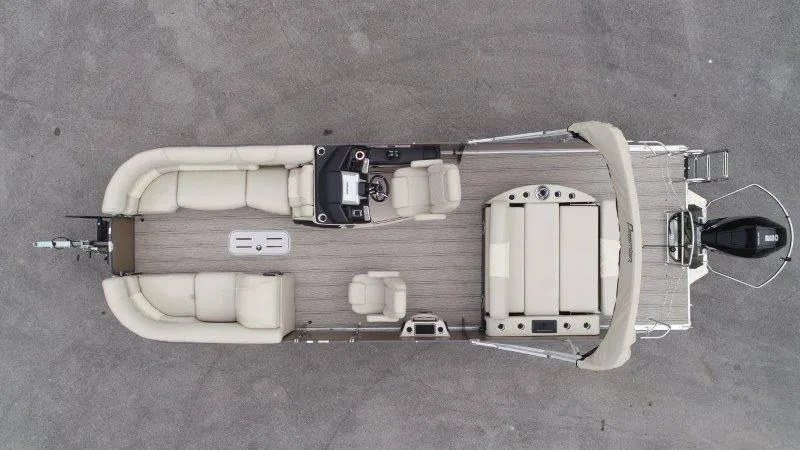 Slide: The Image of Aerial view of 2021 Premier 250 Grand Majestic pontoon boat with beige seating. - 12