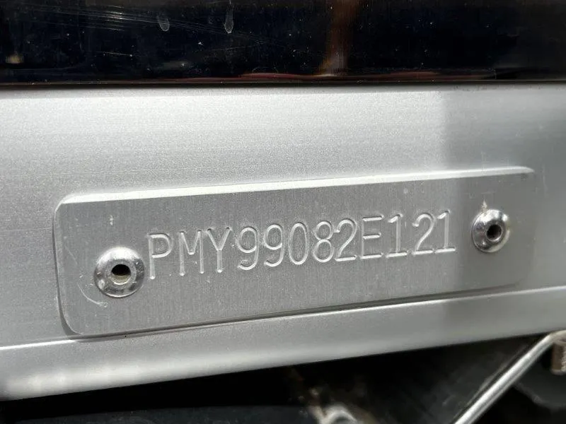 Slide: The Image of VIN plate on 2021 Premier 250 Grand Majestic, displaying "PMY99082E121". - 14