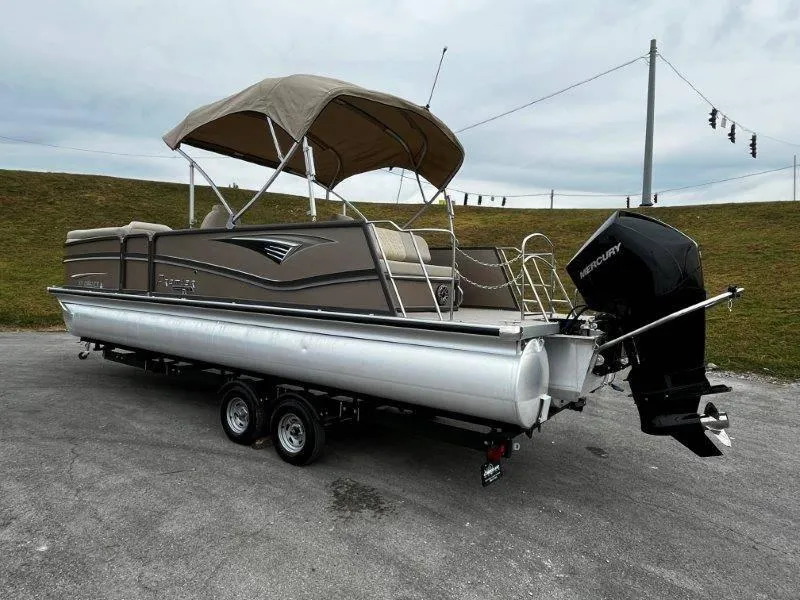 Slide: The Image of 2021 Premier 250 Grand Majestic pontoon boat with canopy and Mercury outboard motor. - 23