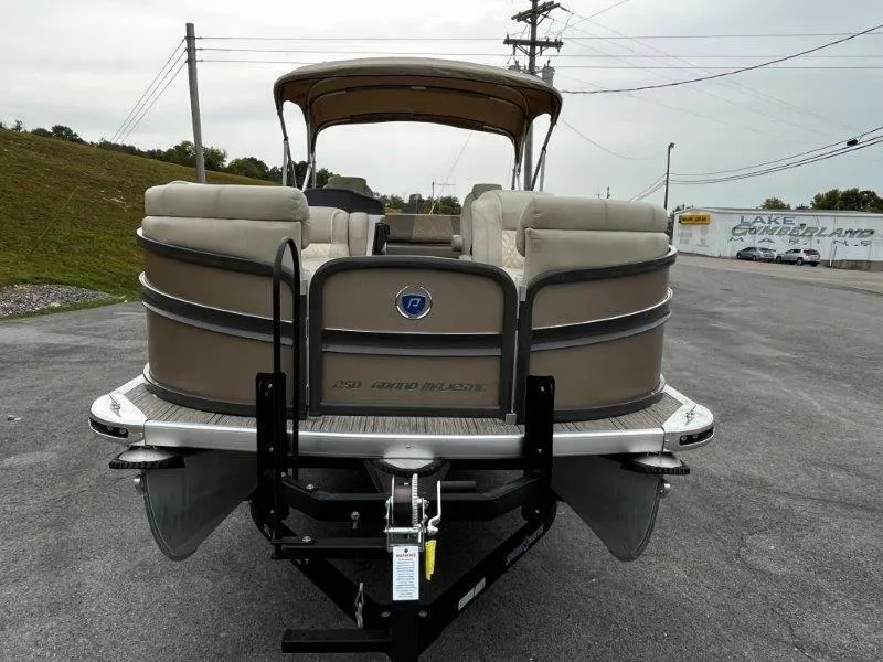 Slide: The Image of 2021 Premier 250 Grand Majestic pontoon boat on trailer, rear view. - 26