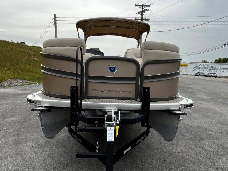 Slide: The Image of 2021 Premier 250 Grand Majestic pontoon boat on trailer, rear view. - 35