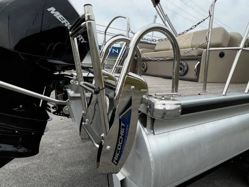 Slide: The Image of 2021 Premier 250 Grand Majestic pontoon boat with Mercury engine and Ricochet ladder system. - 38