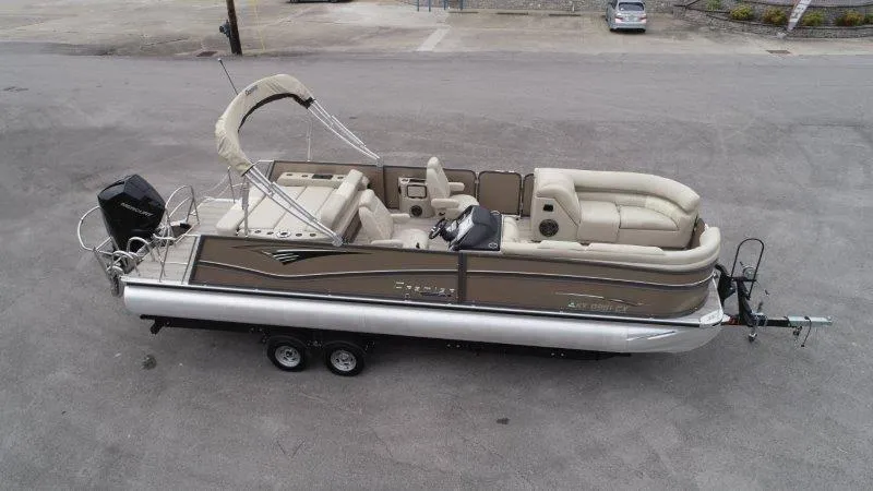 Slide: The Image of 2021 Premier 250 Grand Majestic pontoon boat on trailer, aerial view. - 4