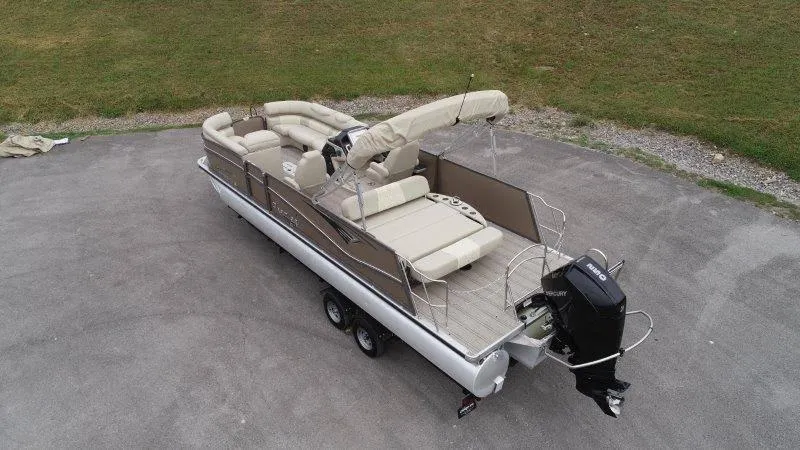 Slide: The Image of 2021 Premier 250 Grand Majestic pontoon boat on trailer, aerial view. - 8