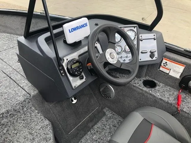 Slide: The Image of 2025 Tracker Pro Guide V-175 Combo boat dashboard with Lowrance electronics and modern controls. - 11
