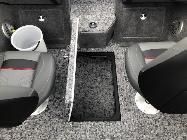 Slide: The Image of 2025 Tracker Pro Guide V-175 Combo boat interior with storage compartment and seating. - 15