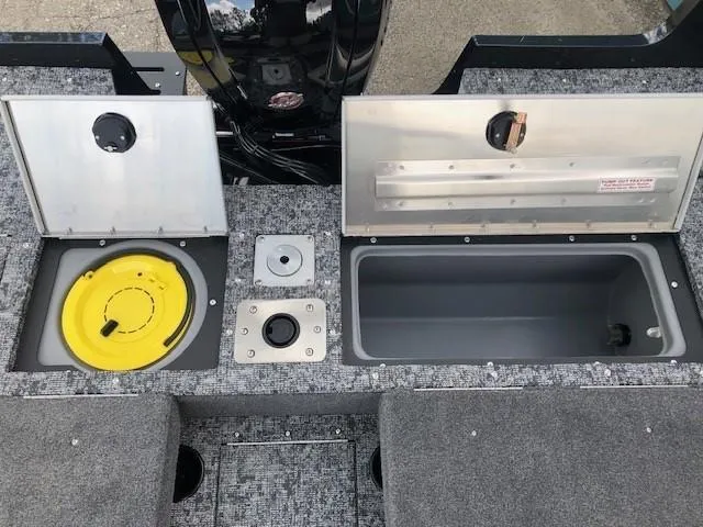 Slide: The Image of 2025 Tracker Pro Guide V-175 Combo boat storage compartments and seating area. - 18