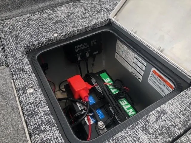 Slide: The Image of Battery compartment of 2025 Tracker Pro Guide V-175 Combo boat. - 19