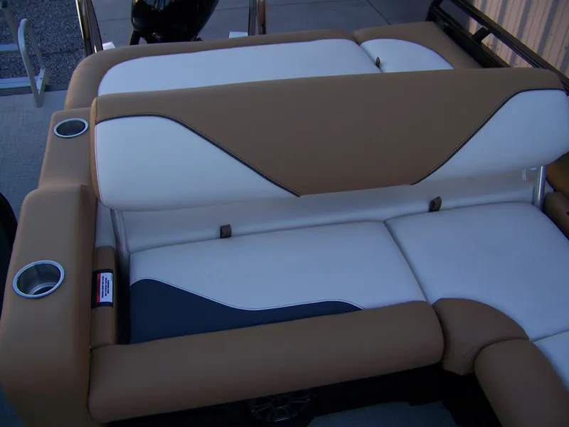 Slide: The Image of Luxurious seating on 2025 Avalon Ven25VRB boat with cup holders and stylish design. - 11