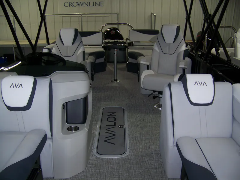 Slide: The Image of 2025 Avalon LSZ23QLS pontoon boat interior with modern seating and sleek design. - 6