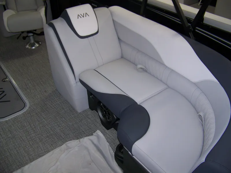 Slide: The Image of 2025 Avalon LSZ23QLS boat interior with plush gray seating and modern design. - 7