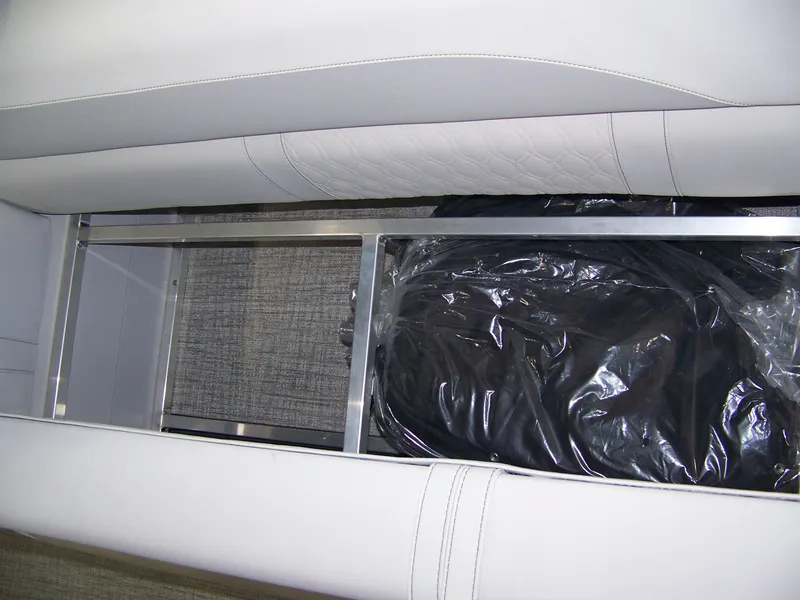 Slide: The Image of Interior storage compartment of 2025 Avalon LSZ25VRB, featuring sleek design and ample space. - 4