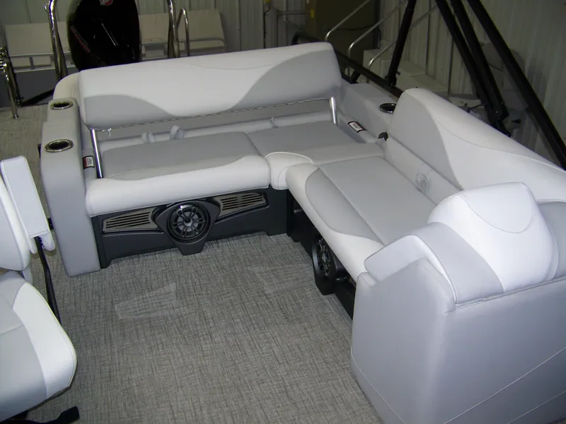 Slide: The Image of Luxurious seating area in 2025 Avalon LSZ25VRB boat, featuring plush gray upholstery. - 5