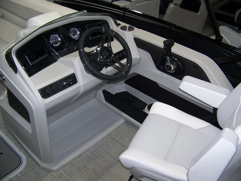 Slide: The Image of 2025 Avalon LSZ25VRB boat cockpit with modern steering and controls. - 6