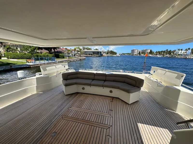 Slide: The Image of Luxurious 1998 Ferretti Yachts 80 with spacious deck and waterfront view. - 10