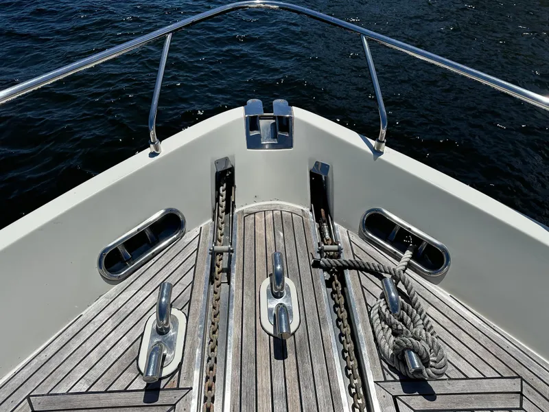 Slide: The Image of Bow of 1998 Ferretti Yachts 80 with teak deck and mooring equipment. - 2