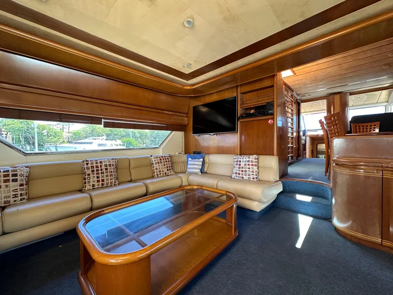 Slide: The Image of Luxurious interior of a 1998 Ferretti Yachts 80 with elegant seating and modern amenities. - 21