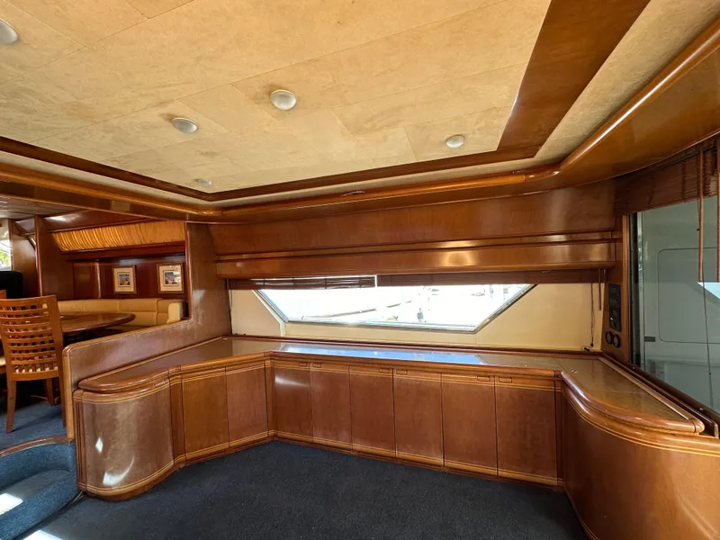 Slide: The Image of Luxurious interior of 1998 Ferretti Yachts 80 with elegant wood paneling. - 22