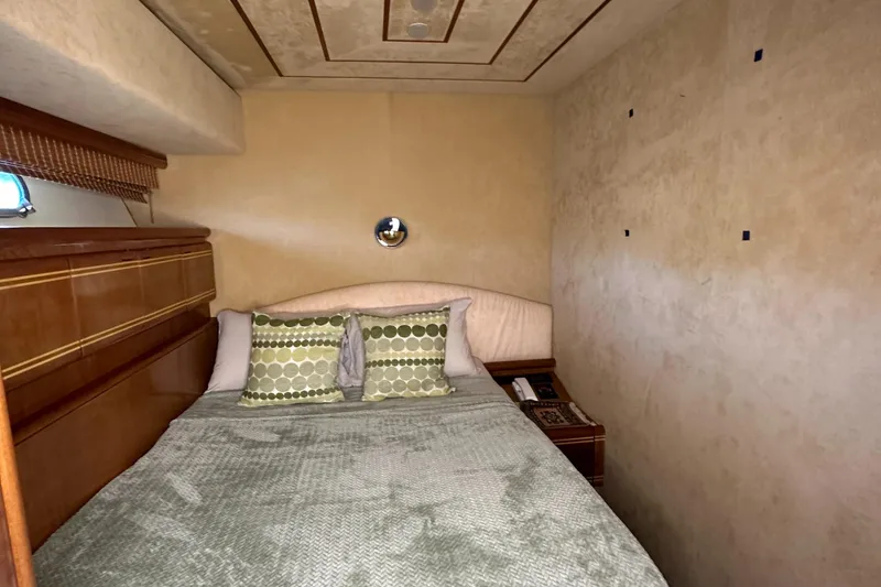 Slide: The Image of Cozy bedroom in 1998 Ferretti Yachts 80 with elegant decor and plush bedding. - 32