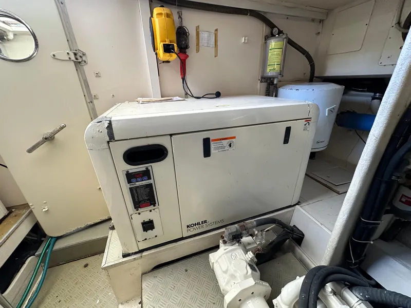 Slide: The Image of Engine room of 1998 Ferretti Yachts 80 with Kohler generator. - 38