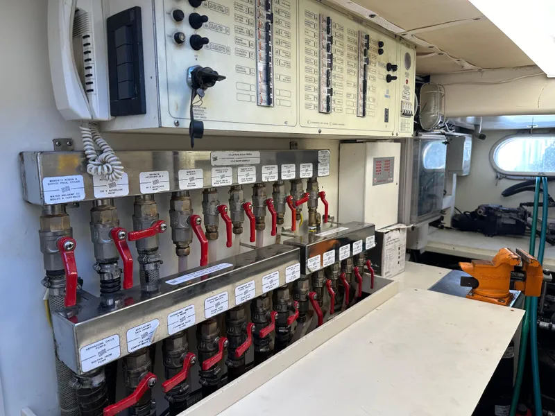 Slide: The Image of Control panel and valves in a 1998 Ferretti Yachts 80 engine room. - 39