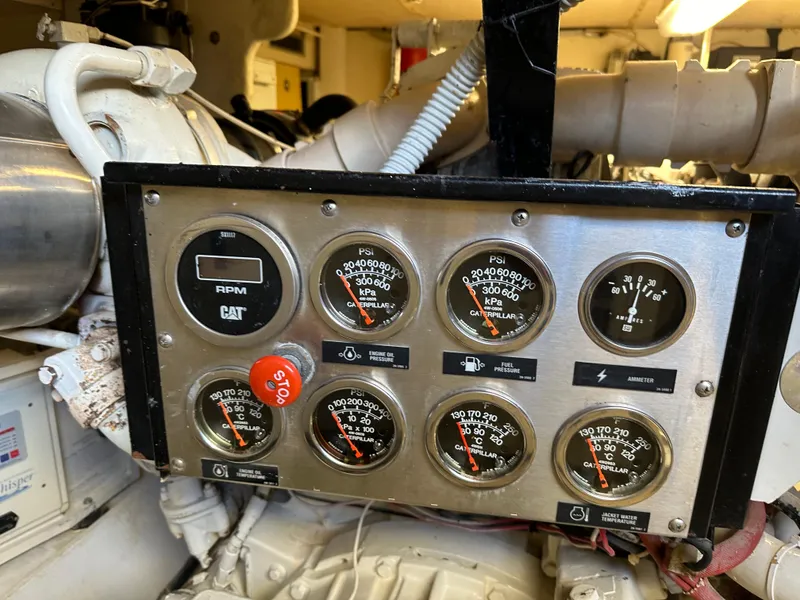 Slide: The Image of Control panel of a 1998 Ferretti Yachts 80 engine room with various gauges. - 40