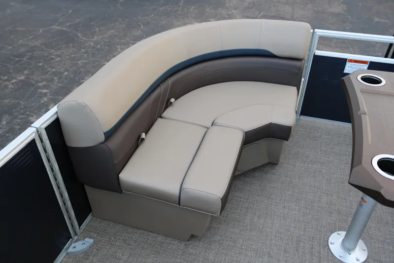 Slide: The Image of 2025 Bennington 20 SSRCX pontoon boat seating with beige and brown upholstery. - 10