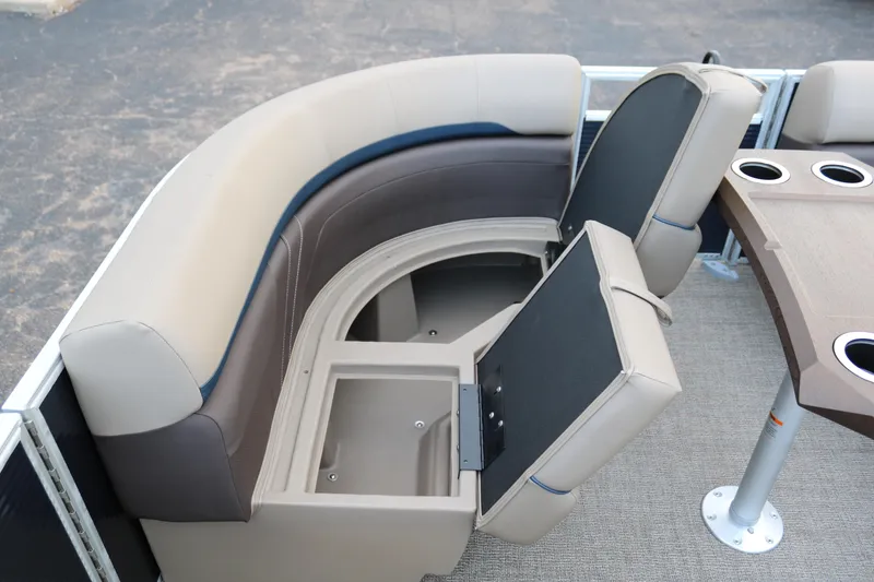 Slide: The Image of 2025 Bennington 20 SSRCX pontoon boat seating with storage compartments. - 11