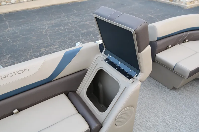 Slide: The Image of Bennington 20 SSRCX 2025 boat seat with open storage compartment. - 20