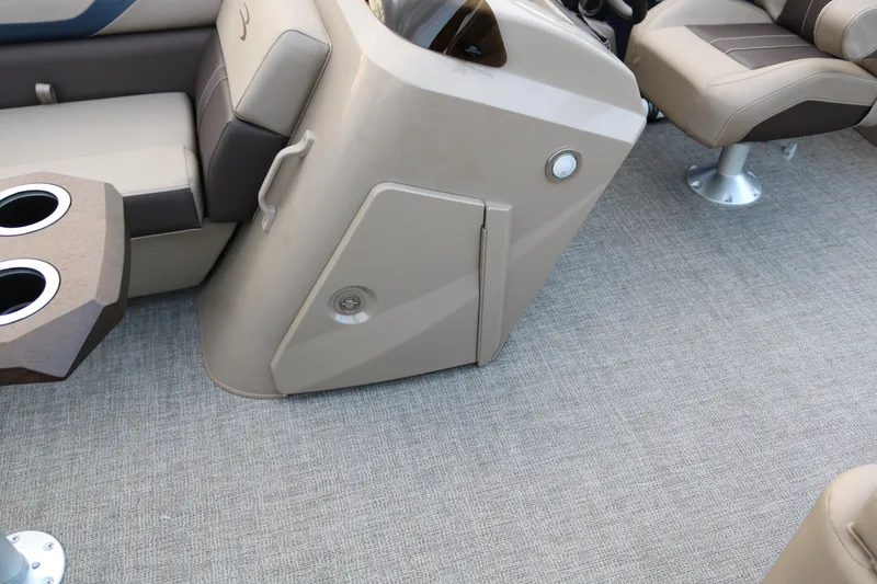 Slide: The Image of 2025 Bennington 20 SSRCX boat interior with beige and brown seating. - 26