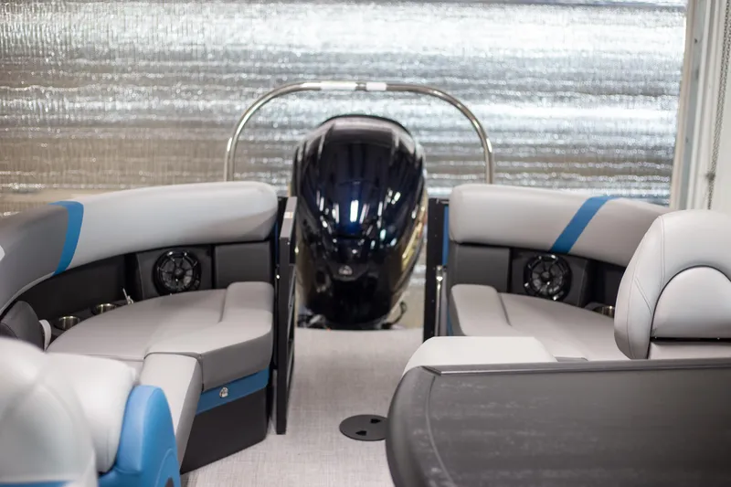 Slide: The Image of Interior of 2025 Trifecta 24E CS3 pontoon boat with plush seating and modern design. - 8