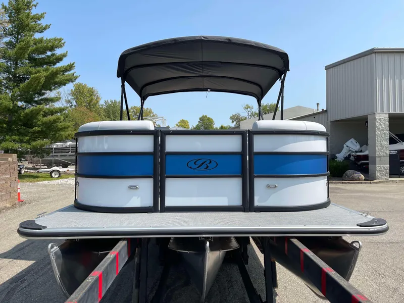 Slide: The Image of 2025 Bentley Pontoons Bolt 223 with canopy, parked outdoors. - 1