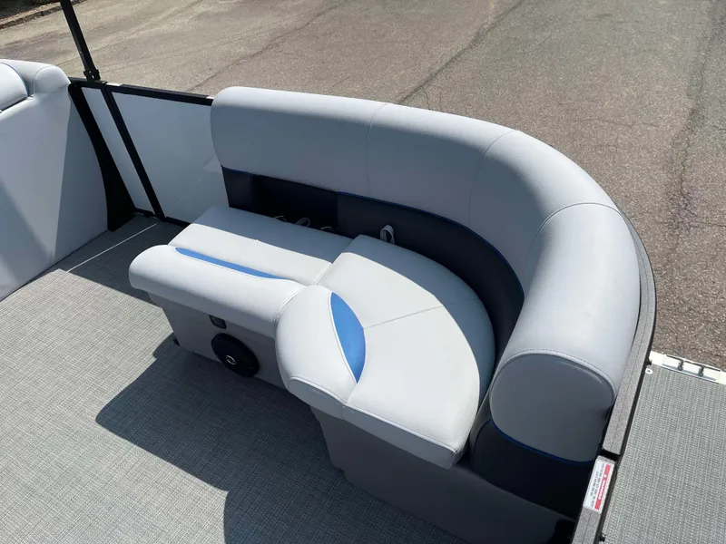 Slide: The Image of 2025 Bentley Pontoons Bolt 223 interior seating with gray upholstery and blue accents. - 10