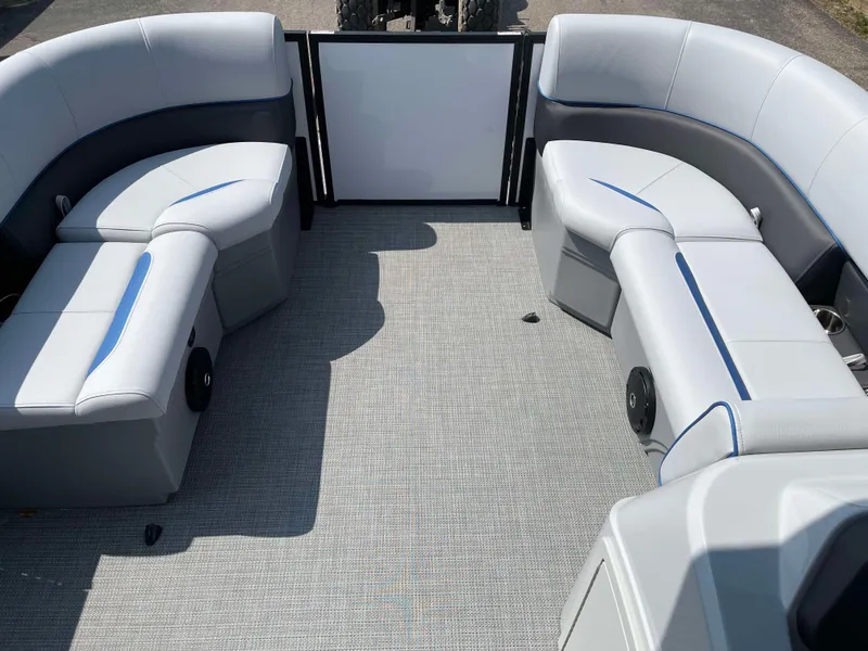 Slide: The Image of 2025 Bentley Pontoons Bolt 223 interior with gray seating and blue accents. - 11