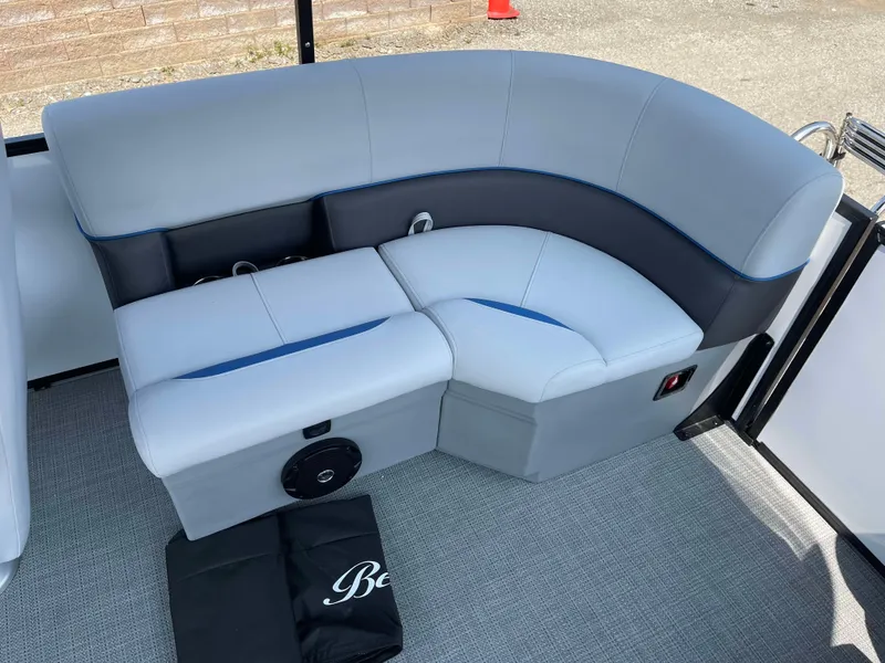 Slide: The Image of 2025 Bentley Pontoons Bolt 223 interior seating with gray and blue upholstery. - 19