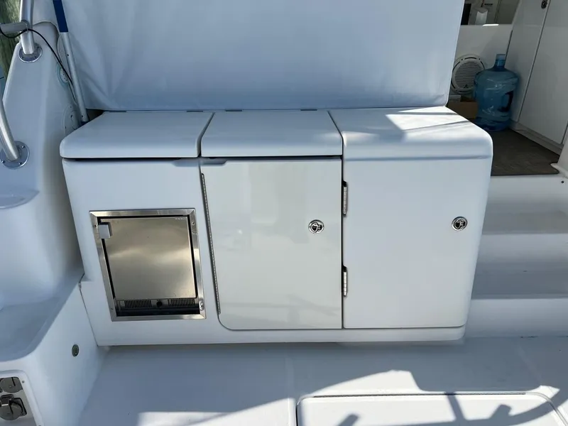 Slide: The Image of 2005 Tiara Yachts 4200 Open yacht deck with storage compartments. - 10