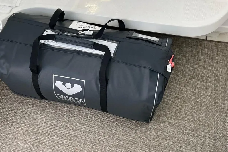 Slide: The Image of Viking branded bag on Tiara Yachts 4200 Open, 2005 model, carpeted deck. - 18