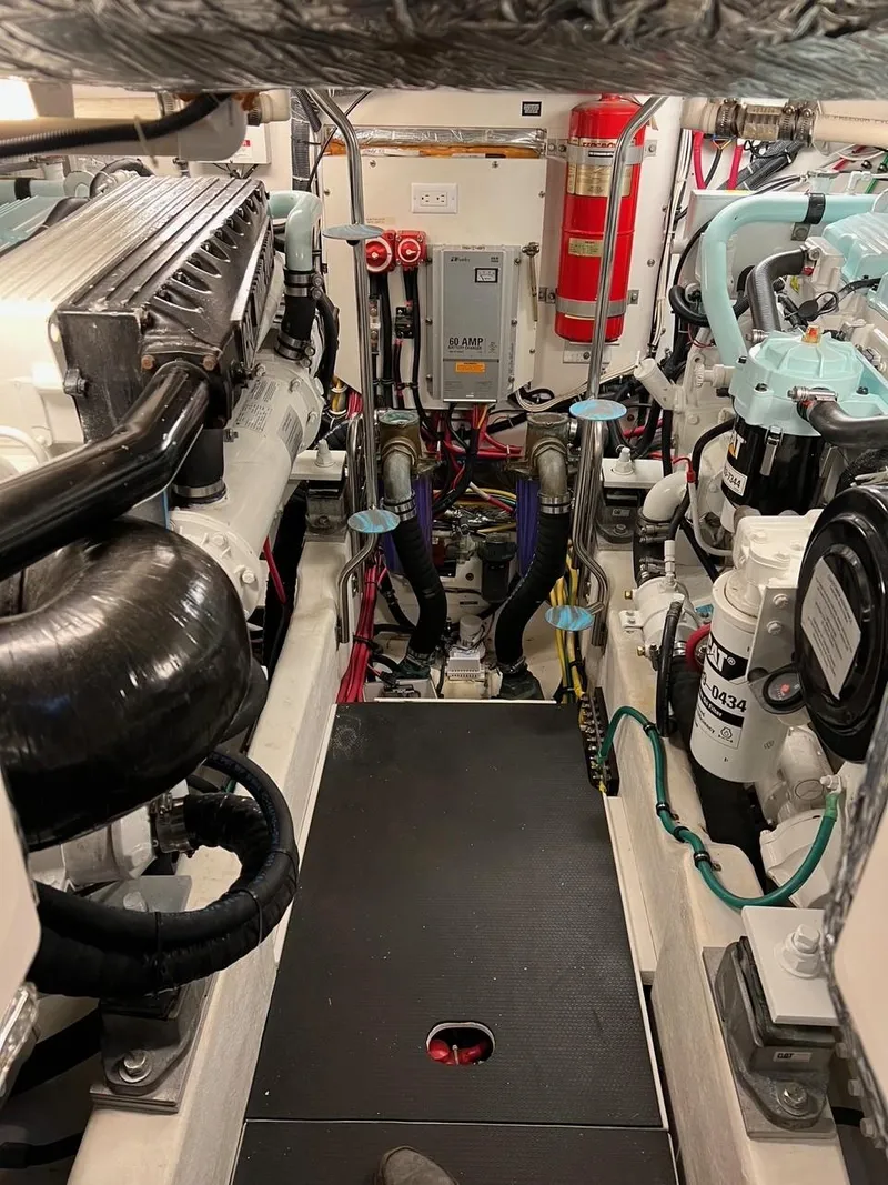 Slide: The Image of Engine room of 2005 Tiara Yachts 4200 Open, showcasing mechanical components and systems. - 22