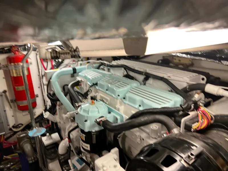 Slide: The Image of Engine room of 2005 Tiara Yachts 4200 Open, showcasing detailed machinery and components. - 23