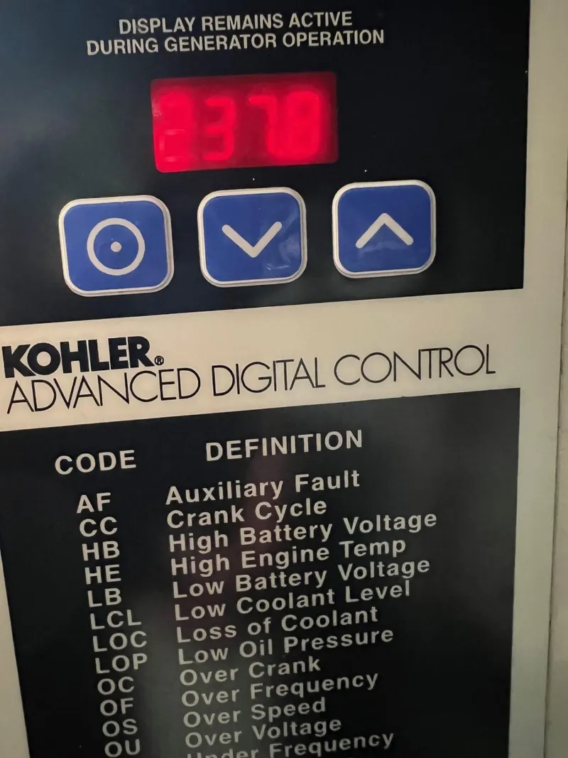Slide: The Image of Kohler advanced digital control panel on 2005 Tiara Yachts 4200 Open, displaying code 370. - 33
