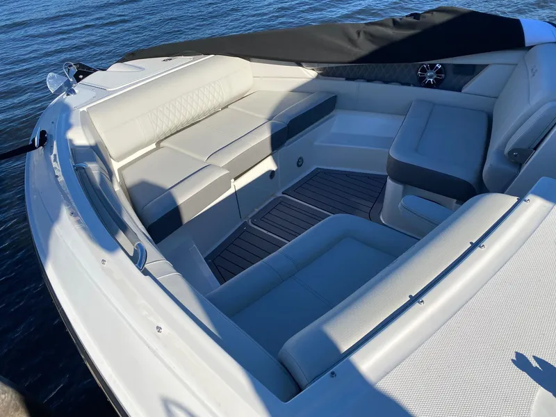 Slide: The Image of 2020 Sea Ray SLX 350 boat interior with luxurious seating and sleek design. - 4